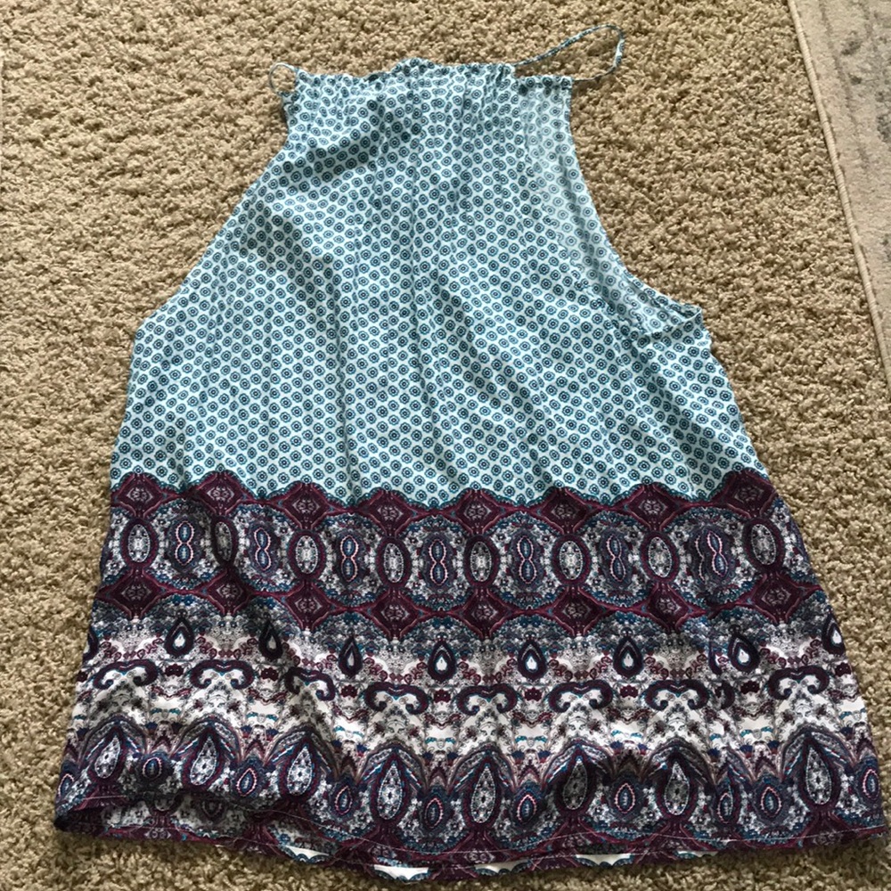 LF mini pattern dress with cut out sides.